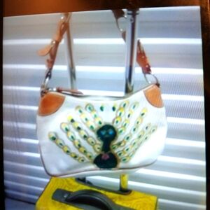 Dooney & Bourke White and Tan Peacock Shoulder Bag